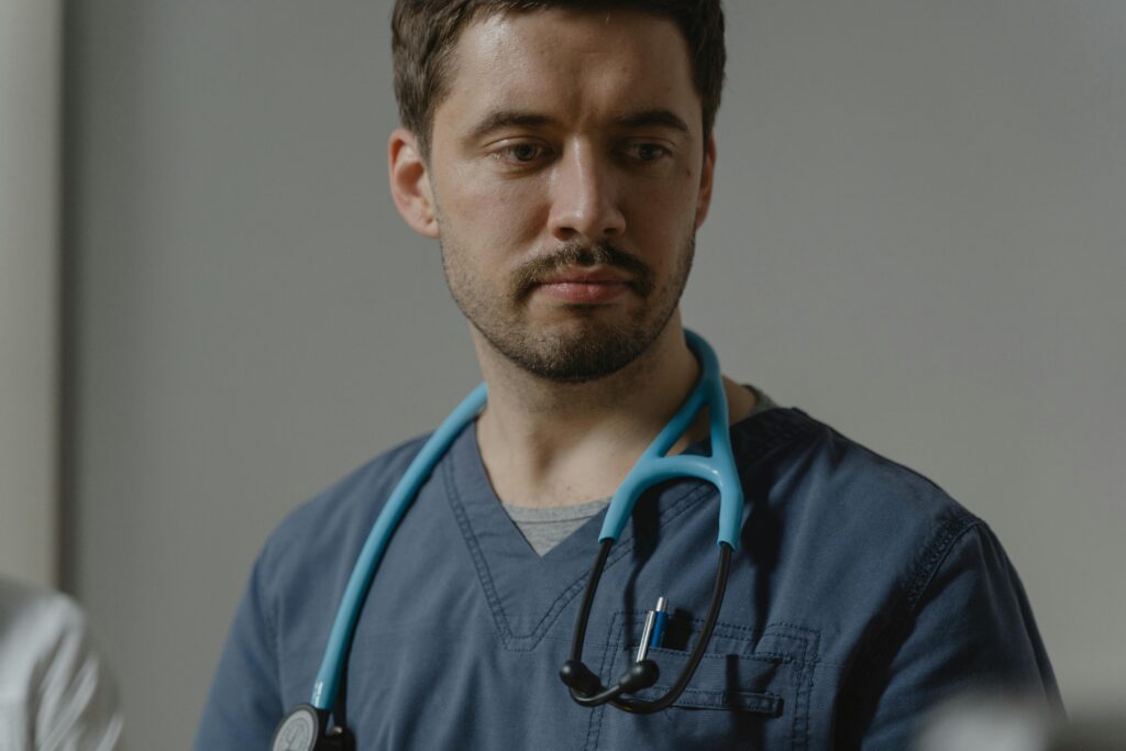 pexels-photo-6234601-6234601 A Man Wearing a Stethoscope on His Neck